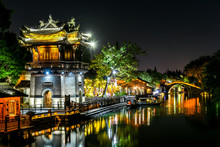 Night View Of The Famous And Beautiful Water Town Scenery Of West Gate Wuzhen Town Ancient Is A Historical And Cultural Town In Zhejiang CHINA.