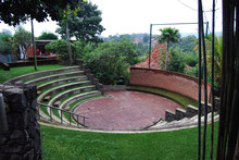 Outdoor Amphitheater In The Middle Of Garden