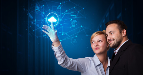 Poster - Man and woman touching hologram projection displaying cloud system