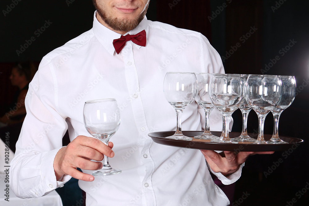 waiter with bow tie