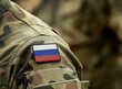 © Bumble Dee - Flag of Russia on military uniform. Army, troops, soldiers. Collage.