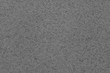 Blurred background texture of old gray paper. Grains.