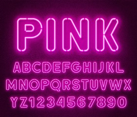 Aufkleber - Neon rounded pink font, glowing alphabet with numbers. on a dark background.