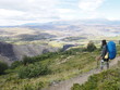 © Mithrax - A man climber staring at the green wilderness below, An amazing view, Torres del Paine trekking, Torres del Paine National Park, Patagonia, Chile