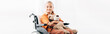 © LIGHTFIELD STUDIOS - panoramic shot of smiling kid holding teddy bear and sitting on wheelchair