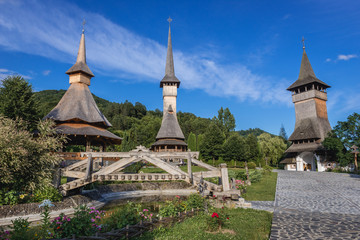 Sticker - View on the summer altar, church and gateway of famous Barsana Monastery in Maramures region in Romania