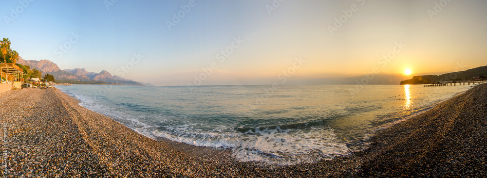 Panorama of the sea coast of Kemer in Turkey at sunrise - obrazy, fototapety, plakaty 