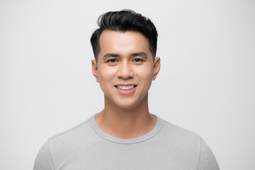 young asian man close up shot isolated on white