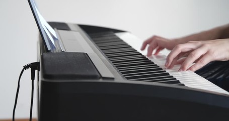 Poster - Closeup view of teenage girl playing piano