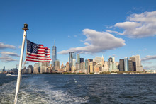 New York Skyline And American Flag