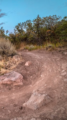 Wall Mural - Vertical Hiking trail taking a sharp U-turn in Utah