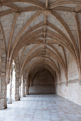  Archways in an old monastery in Portugal, vertical 