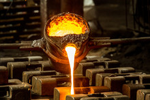 Metal Casting Process With Red High Temperature Fire In Metal Part Factory