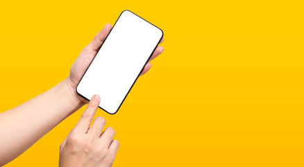 Poster - Hand touch mobile screen mockup on yellow background. Clipping path include all hand and mobile screen.connect technology concept
