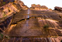 Tall Vertical Cliffs Along The Riverside Walk Trail In Zion National Park - Utah, USA