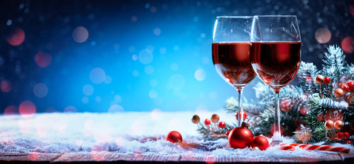 Wall Mural - Red wine and Christmas ornaments