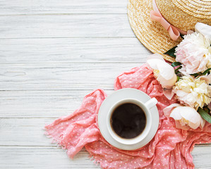 Cup of tea and peonies