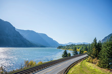 Railway Track And Vehicles Road Along The Columbia River In Columbia Gorge