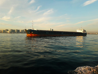 Wall Mural - Cargo Ship view before sunset