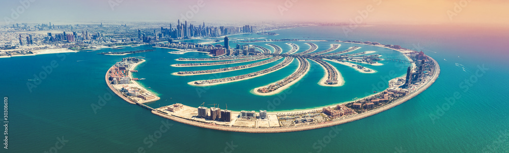 Aerial view on Palm Jumeira island in Dubai, UAE, on a summer day. - obrazy, fototapety, plakaty 