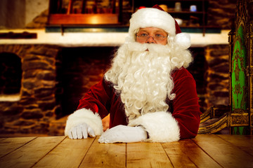 Wall Mural - Red old Santa Claus and fireplace in home interior.