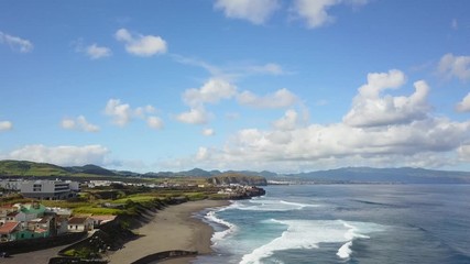 Wall Mural - Amazing aerial view over the Monte Verde Beach, with small waves on the atlantic ocean, shoreline coast of the island scenic view, São Miguel, Azores