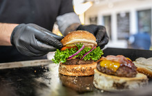 Preparing Of Fresh Burger With Potato Fries Chips On Grill