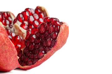 Wall Mural - pomegranate slice close-up isolated on a white background