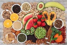 Health Food For Energy, Vitality & Fitness With Fruit, Vegetables, Nuts, Seeds, Legumes, Cereal  & Herbal Medicine.  High In Vitamins, Minerals Antioxidants, Smart Carbs, Protein & Omega 3. Flat Lay, 