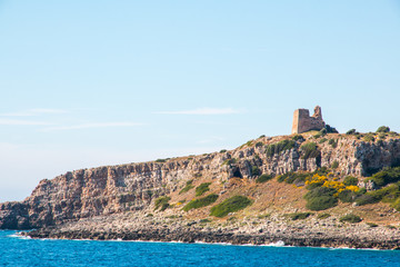 Watchtower near ionian sea (Uluzzo tower in Porto Selvaggio) Apulia, Salento, Italy