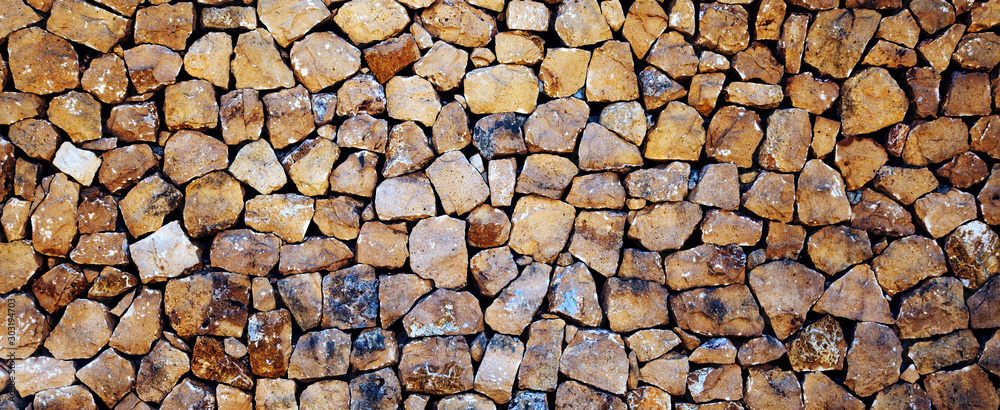 Stones, rocks and boulders - as a stone wall background texture / abstract design. - obrazy, fototapety, plakaty 