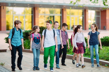 Wall Mural - Group of kids going to school together.