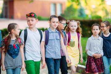 Wall Mural - Group of kids going to school together.