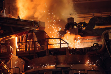 Wall Mural - Melting of metal in a steel plant. High temperature in the melting furnace.