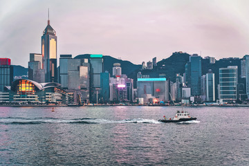 Wall Mural - Water boat at Victoria Harbor in Hong Kong. View from Kowloon on HK Island.