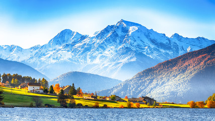 Wall Mural - splendid autumn panorama of haidersee (lago della muta) lake with ortler peak on backgroun