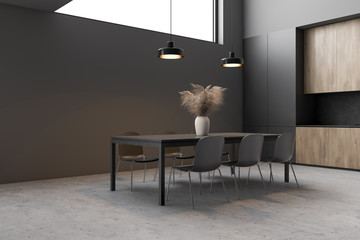 Gray dining room and wooden kitchen corner