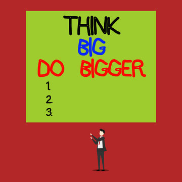 Handwriting text Think Big Do Bigger. Conceptual photo Raise the Bar and Aim far Higher than the Usual Isolated view young man standing pointing upwards two hands big rectangle