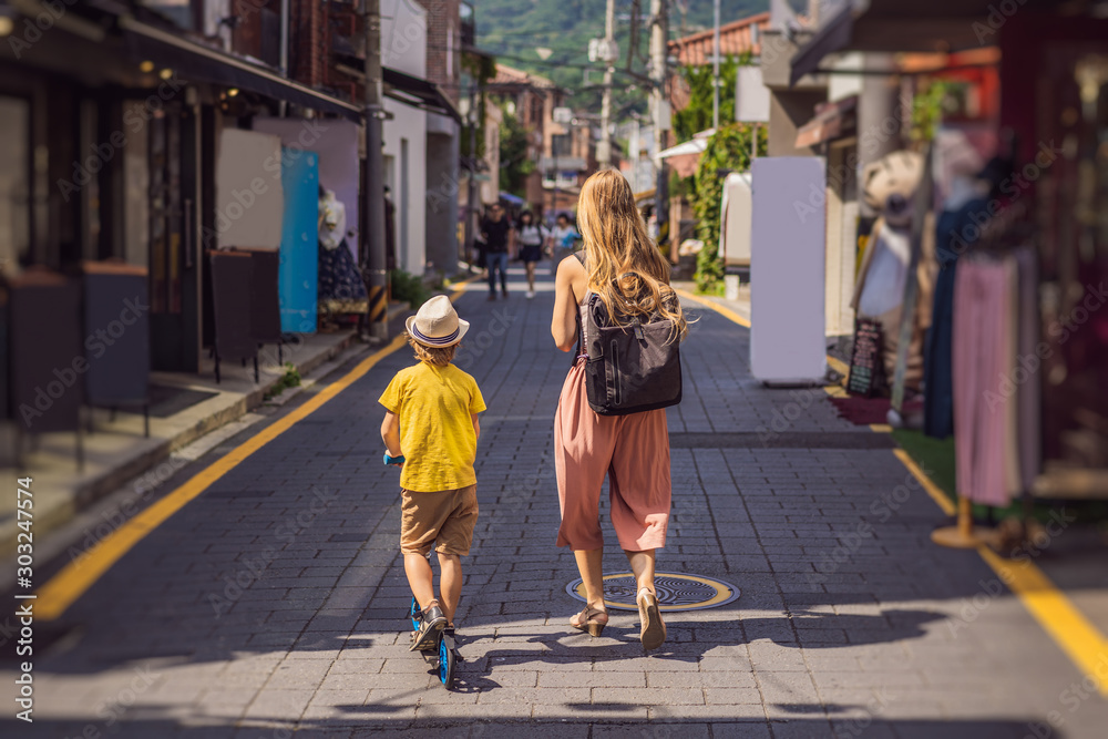 Mom and son tourists in Bukchon Hanok Village is one of the famous ...