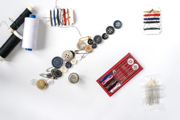 Sewing supplies on a white background