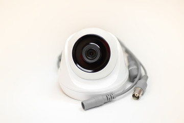 CCTV View of a white dome security camera isolated on white background