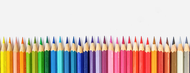 Color pencils isolated on white background close up with Clipping path.Beautiful color pencils.Color pencils for drawing  Rainbow color pencil and used as a background.