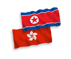 Flags of North Korea and Hong Kong on a white background