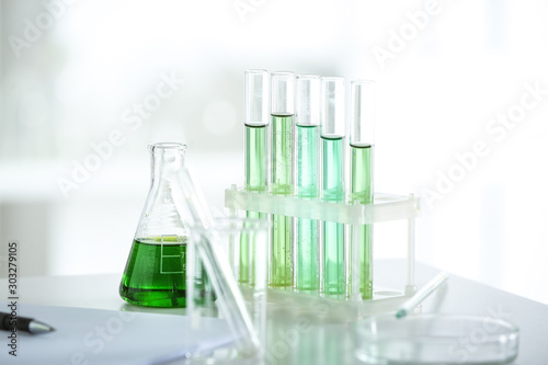 Test tubes with samples on table in laboratory