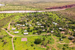 © Philip Schubert - Oblique aerial view of  the abandoned indigenous community 'Oombulguri,' formerly Forrest River Mission, near Wyndham in Cambridge Gulf in the Kimberley region of Western Australia.