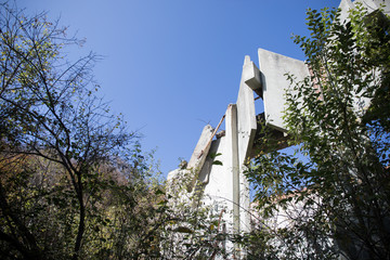 Autumn forest and old soviet building. Azerbaijan Ganja