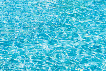 abstract and surface pool water reflect with sun light background