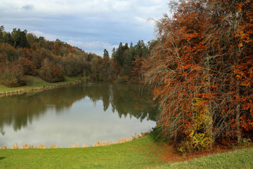 Beautiful quiet lake in the autumn day