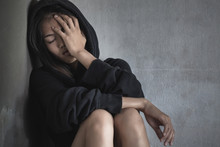 Alone And Scare Asian Woman,Human Trafficking Concept.Depression, Drug Addiction Symptoms.