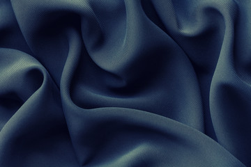 Wall Mural - dark blue fabric with large folds, abstract background